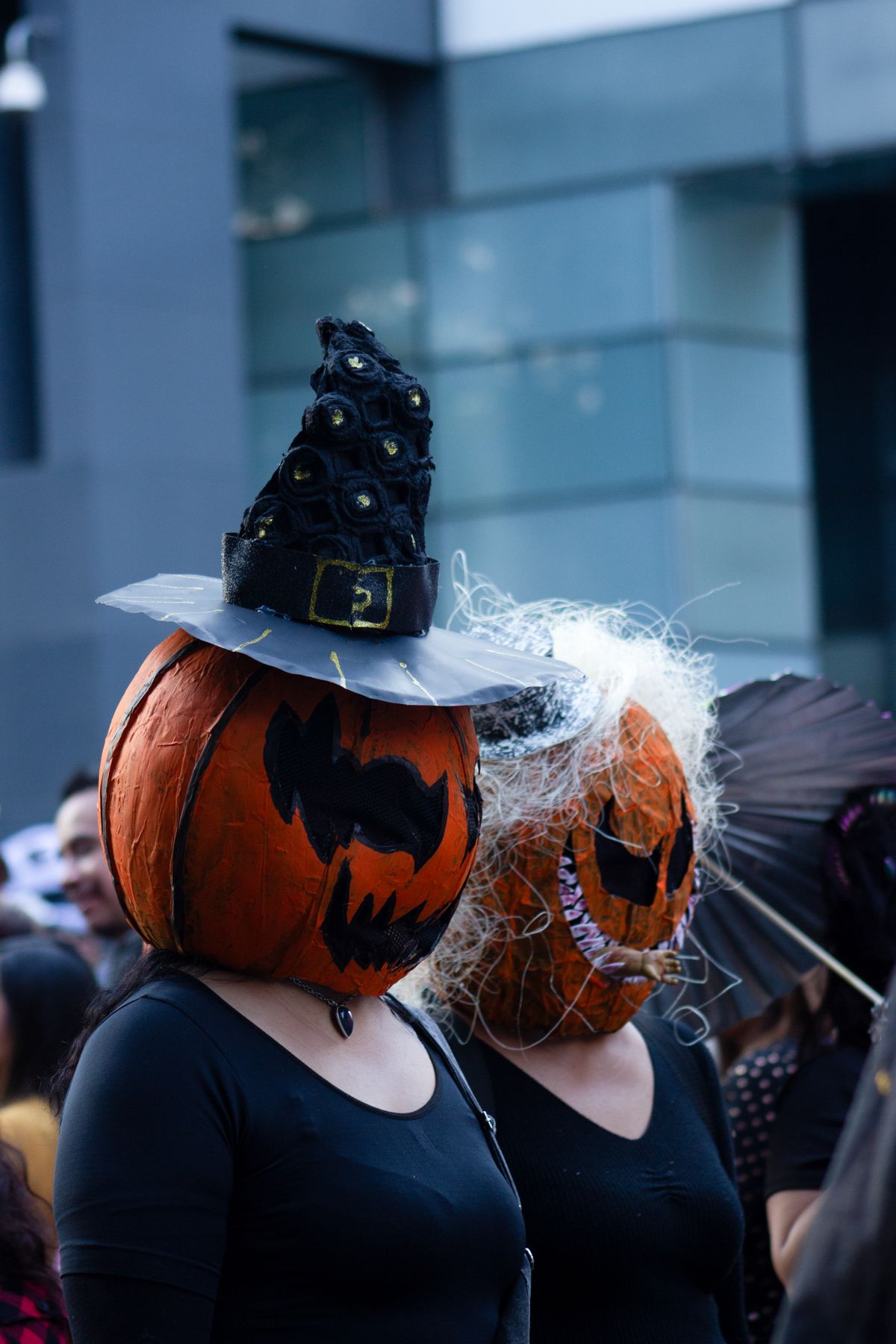 A group of people wearing Halloween costumes