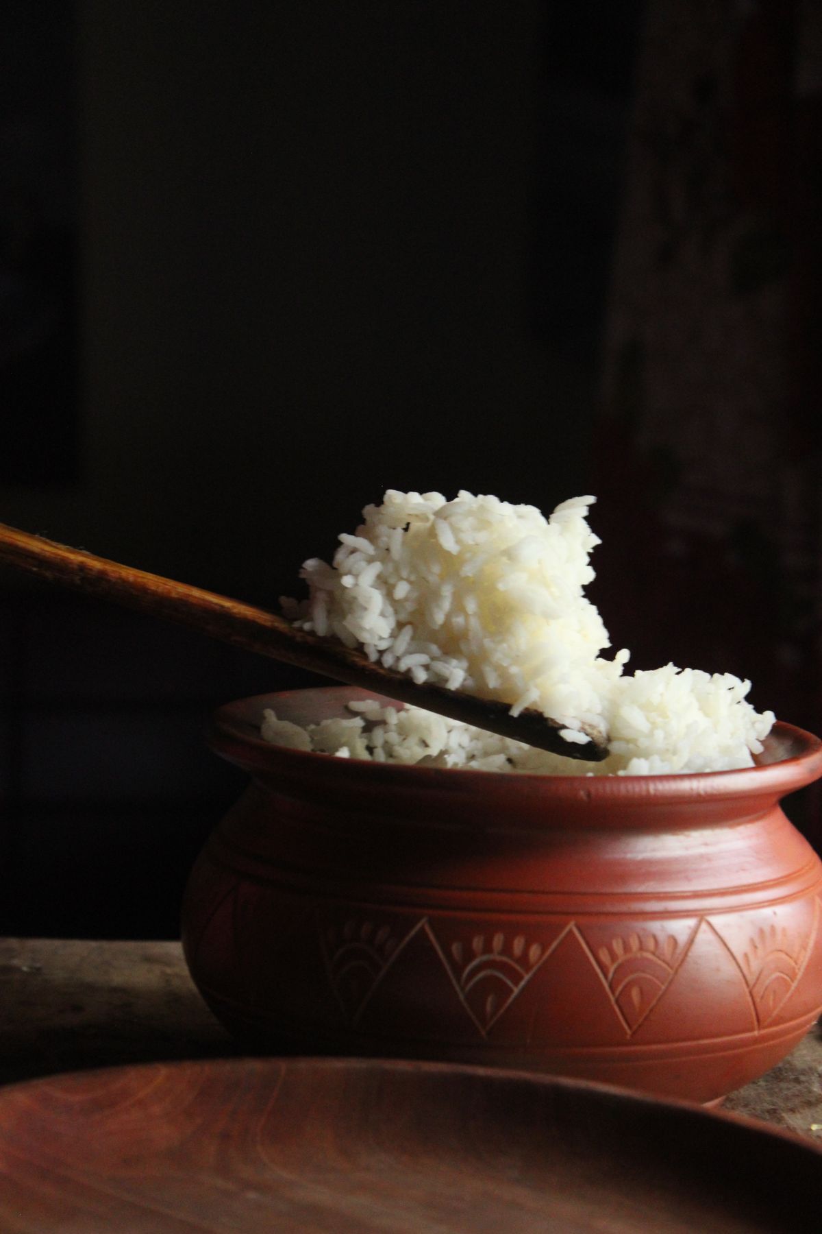 Freshly cooked rice in a traditional clay pot